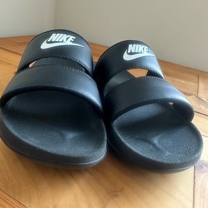 Nike “revive foam” slides.